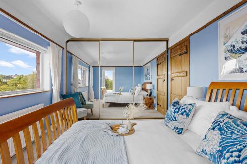 Katil atau katil-katil dalam bilik di Blue Haze - Family accommodation with private beach access