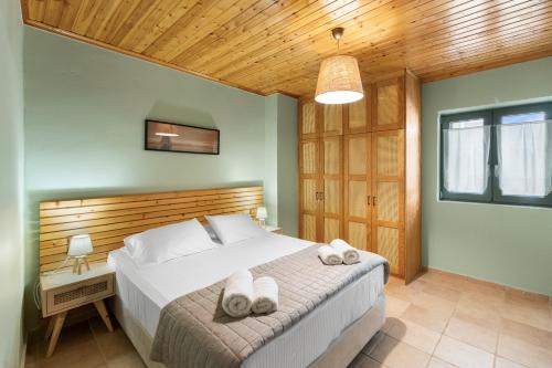 Postel nebo postele na pokoji v ubytování Villa Aurora