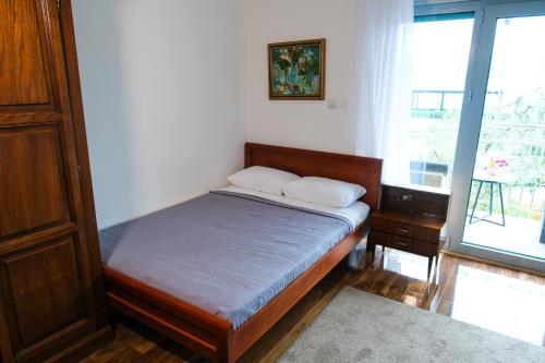 Cama o camas de una habitación en Qumi Apartments