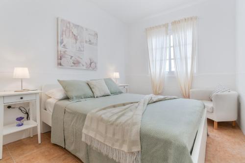 Postel nebo postele na pokoji v ubytování Calida Vivienda Accesible