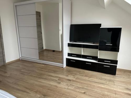 TV a/nebo společenská místnost v ubytování Duplex Apartment