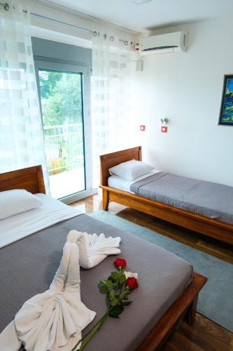 Cama o camas de una habitación en Qumi Apartments