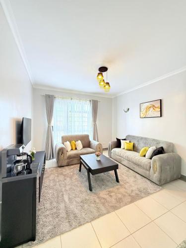 Posezení v ubytování Fairway apartments