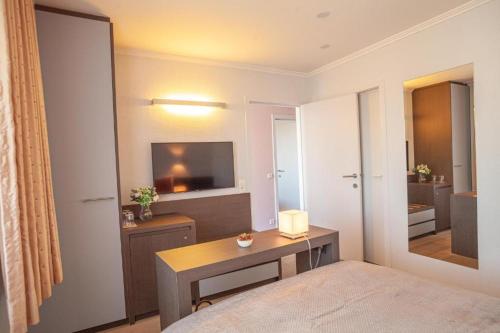 Ein Bett oder Betten in einem Zimmer der Unterkunft Hotel Monaco Zeebrugge Beach by Rikas Hotels