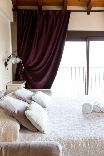 Postel nebo postele na pokoji v ubytování Corte dei Soavi Suites - Apartments