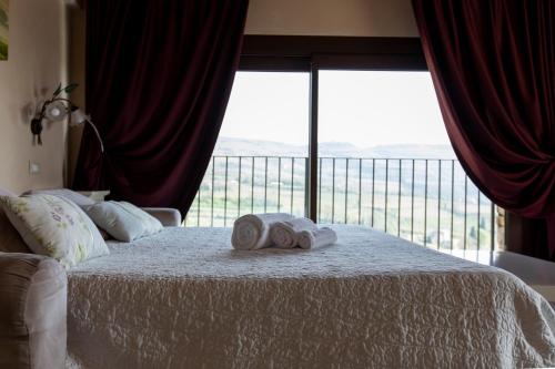 Postel nebo postele na pokoji v ubytování Corte dei Soavi Suites - Apartments