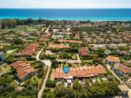 an aerial view of a suburb with a stop sign at Casa Vacanze Claudia in Costa Rei