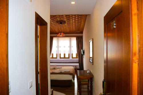 Postel nebo postele na pokoji v ubytování Hotel Kodra
