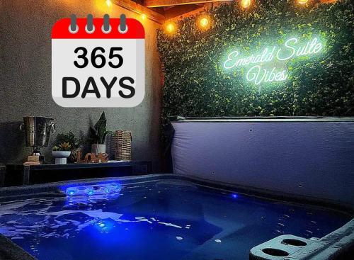 a hot tub with a sign that says annual saleaturdays at 2BR - Hot Tub & 2 Parking - 8 min to Old Quebec in Quebec City