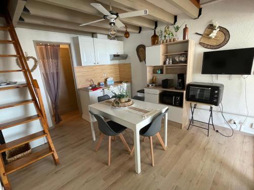 Photo de la galerie de l'établissement Balcon sur la Lagune, à Saint Cyprien Plage