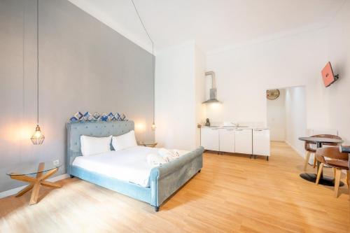 En eller flere senge i et værelse på GuestReady - Boavista homes