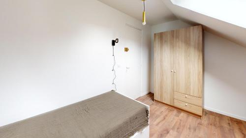 Postel nebo postele na pokoji v ubytování Studio Coty 2èmeD