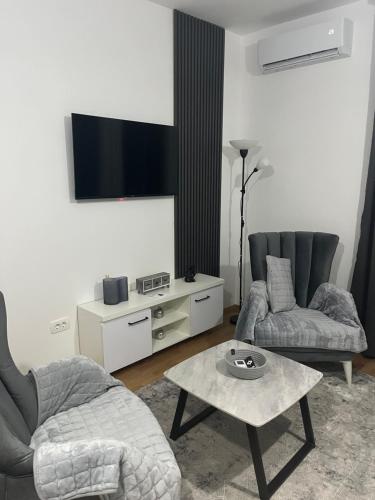 TV a/nebo společenská místnost v ubytování Zen Apartments