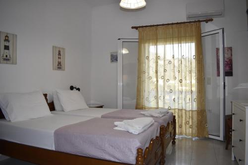 Letto o letti in una camera di Katerinas Private Apartments