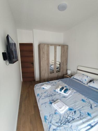 Ένα ή περισσότερα κρεβάτια σε δωμάτιο στο Apartman Sunce Bijela
