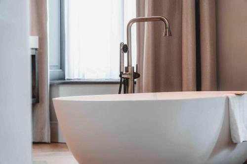 Un baño de Abdij - Suites