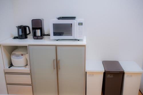 Nhà bếp/bếp nhỏ tại 北谷町港1