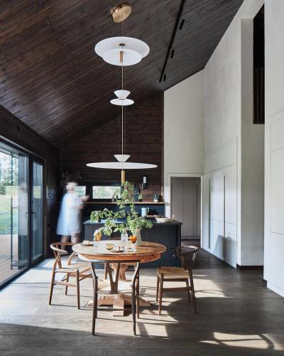 a dining room with a table and chairs at Siedlisko Ublik in Wyszowate