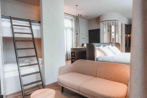 Postel nebo postele na pokoji v ubytování Abdij - Suites