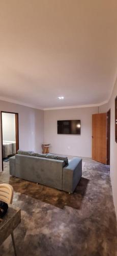 a large bedroom with a large bed in a room at Casa Fundo de Quintal in Baía Formosa