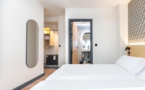 Katil atau katil-katil dalam bilik di Novarooms by MyHouseSpain