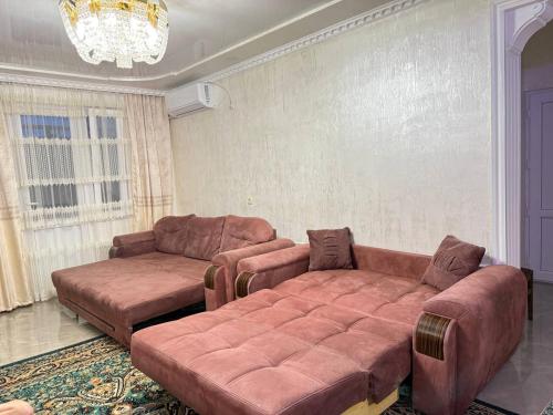 a living room with two couches and a couch at Nugzar House Chakvi - 2 Bedrooms in Chakvi