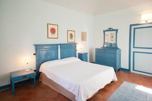 Ένα ή περισσότερα κρεβάτια σε δωμάτιο στο Agriturismo Poggiolo