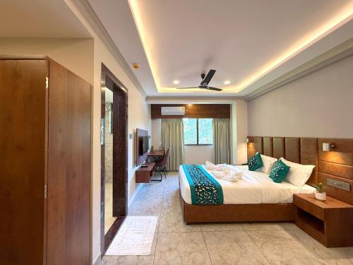 Voodi või voodid majutusasutuse Nexus Green Resort toas