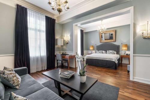 Postel nebo postele na pokoji v ubytování Grand Hotel Oslo