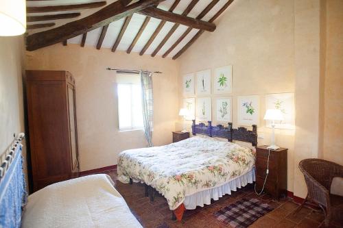 Ένα ή περισσότερα κρεβάτια σε δωμάτιο στο Agriturismo Poggiolo