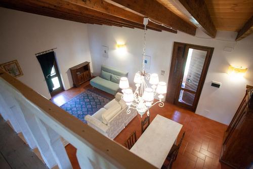 Ένα ή περισσότερα κρεβάτια σε δωμάτιο στο Agriturismo Poggiolo