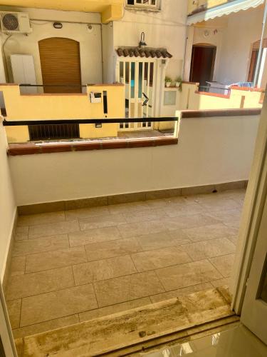 a view of a room with a tile floor at Affittacamere La bottega del barbiere in Scalea