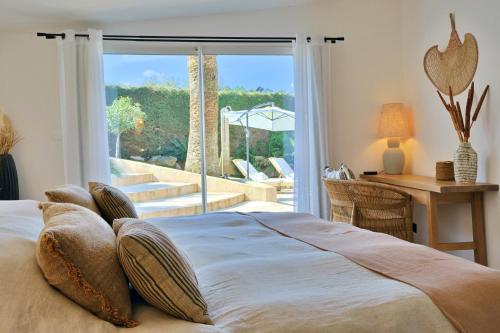 Giường trong phòng chung tại Casa SeaRock