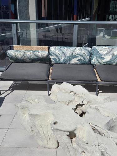 a sculpture of a bench and a couch in a building at Miami-Brickell Luxury 2BR-2BATH with skyline VIEWS - walking distance to HEAT ARENA & BAYSIDE in Miami