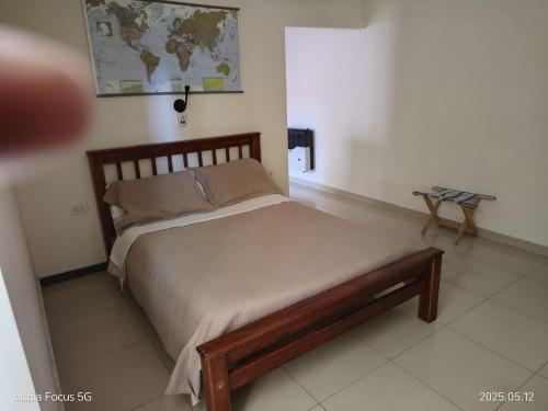 Ένα ή περισσότερα κρεβάτια σε δωμάτιο στο tranquilidad, confort y seguridad II