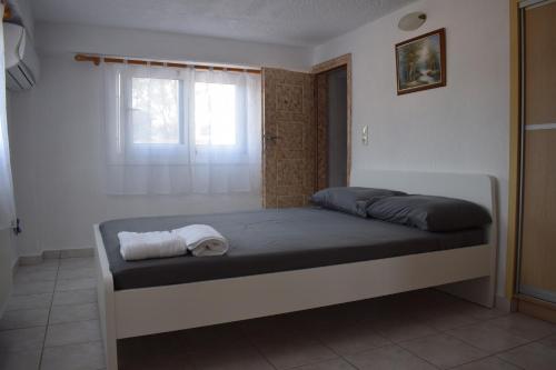 Posteľ alebo postele v izbe v ubytovaní Traditional apartment in nature