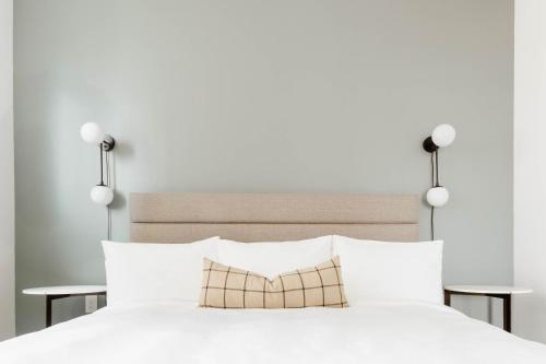 Giường trong phòng chung tại Dorsen Stay