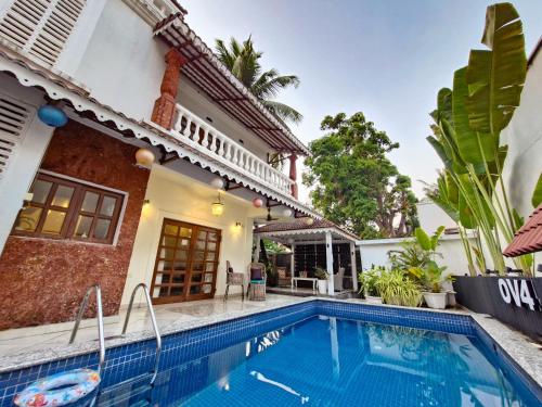 Bazén v ubytování OV Private Pool Villas near Baga, I 4BHK units I Staff nebo v jeho okolí