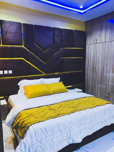 Katil atau katil-katil dalam bilik di E-Vac Homes Exquisite Holiday Home