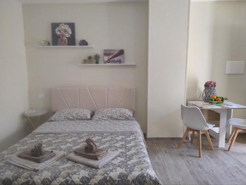 Ένα ή περισσότερα κρεβάτια σε δωμάτιο στο Vicolo Fortuna Holiday home