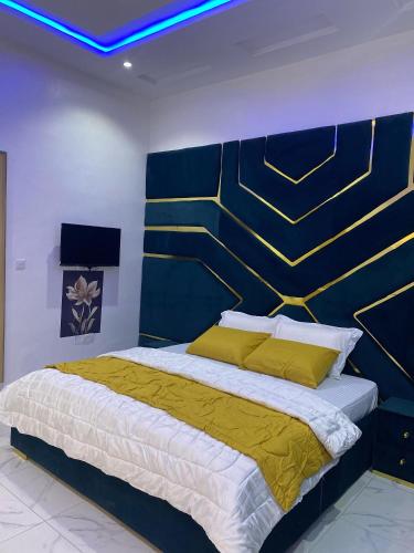 Katil atau katil-katil dalam bilik di E-Vac Homes Exquisite Holiday Home