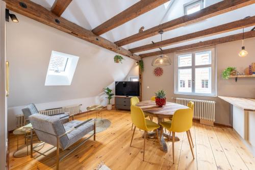 Una televisión o centro de entretenimiento en Design Apartments - "Im Holländerhaus"