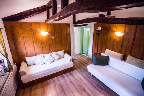 Postel nebo postele na pokoji v ubytování Стальовата Къща - Stalyovata House