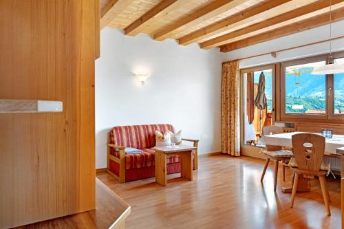 a living room with a couch and a table at Hofanger in Lagundo