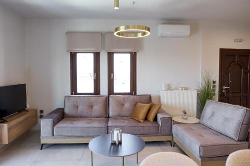 Χώρος καθιστικού στο Pnoẽs Pelion Luxury Seaview Villa with priv Garden