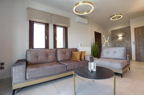 Χώρος καθιστικού στο Pnoẽs Pelion Luxury Seaview Villa with priv Garden