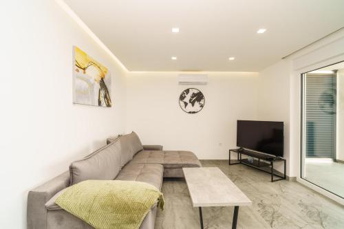 Μια τηλεόραση ή/και κέντρο ψυχαγωγίας στο Apartmani Dujak 2