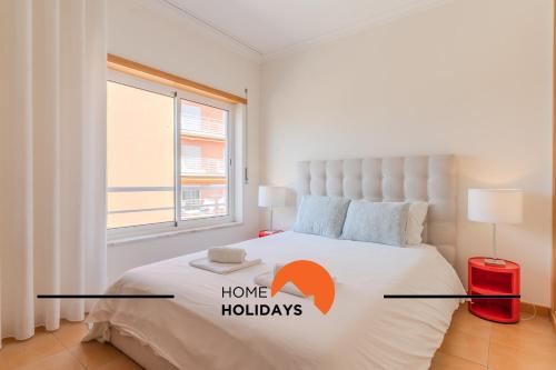 En eller flere senge i et værelse på #311 T1 Quinta dos Arcos by Home Holidays
