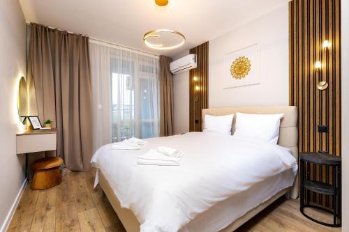 Katil atau katil-katil dalam bilik di 1BR Modern and Cozy Apartment with Free Street Parking