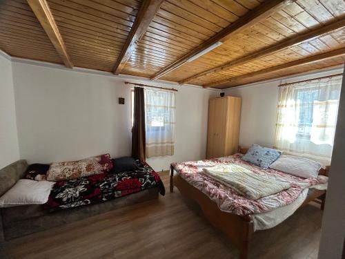 Postel nebo postele na pokoji v ubytování Cabana de vis și pescuit